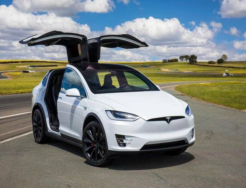 Model x plaid. Tesla model x. Электрокар Tesla model x. Электроавтомобиль Тесла "model x Plaid ". Машина Tesla model x 2018.